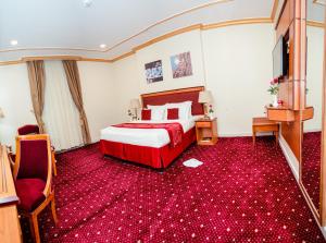 Postel nebo postele na pokoji v ubytování Sama Al Deafah Hotel
