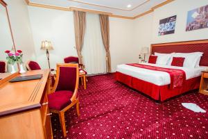 Postel nebo postele na pokoji v ubytování Sama Al Deafah Hotel