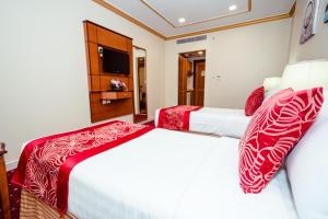 Postel nebo postele na pokoji v ubytování Sama Al Deafah Hotel