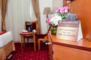 Postel nebo postele na pokoji v ubytování Sama Al Deafah Hotel