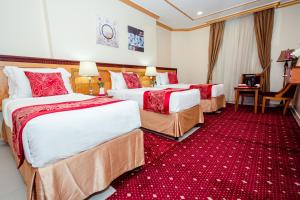 Postel nebo postele na pokoji v ubytování Sama Al Deafah Hotel