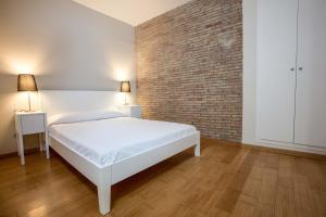 Posteľ alebo postele v izbe v ubytovaní Girona Housing Ginesta 9