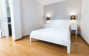 Posteľ alebo postele v izbe v ubytovaní Girona Housing Ginesta 9