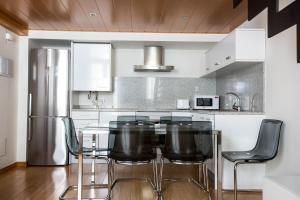 Kuchyňa alebo kuchynka v ubytovaní Girona Housing Ginesta 9