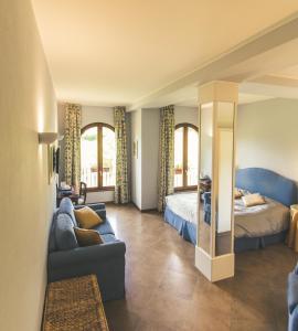 Postel nebo postele na pokoji v ubytování La Valletta Relais