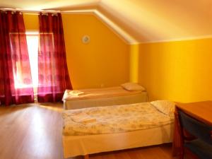 Postel nebo postele na pokoji v ubytování Viva Pirita Hostel