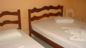 Cama o camas de una habitación en Panoramica Pousada