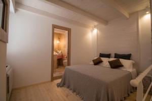 Cama ou camas em um quarto em Casa Martina