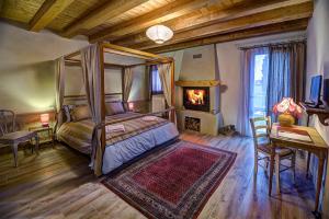 Ліжко або ліжка в номері B&B Corte Vignazza