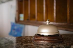 a brown and white object sitting on top of a counter at Hotel Angelino in Ischia