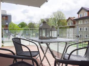 Balkón alebo terasa v ubytovaní VacationClub - Solna Apartment C103