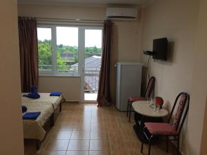 Zona d'estar a Dionisy Guest House