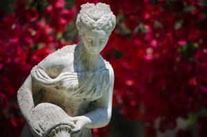 a statue of a woman with her arms crossed at Hotel Angelino in Ischia