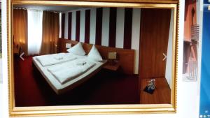 Postel nebo postele na pokoji v ubytování Hotel Relax