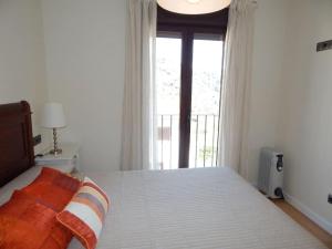 Posteľ alebo postele v izbe v ubytovaní Casa Mirador los Bancales