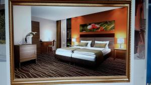 Postel nebo postele na pokoji v ubytování Hotel Relax