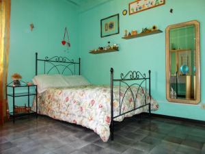Säng eller sängar i ett rum på Casa Ginevra