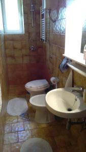 Kylpyhuone majoituspaikassa Villa Gardenia