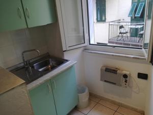 Kjøkken eller kjøkkenkrok på Riomaggiore Appartamenti