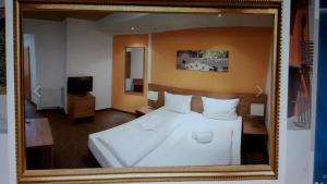 Postel nebo postele na pokoji v ubytování Hotel Relax