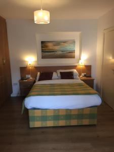 Letto o letti in una camera di Faythe Guesthouse