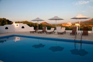 The swimming pool at or close to Cavo Plako Villas