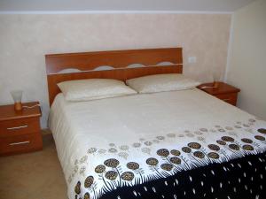 Postel nebo postele na pokoji v ubytování CUORE di GIULIETTA