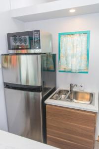 Kuchyň nebo kuchyňský kout v ubytování Tiny House Siesta