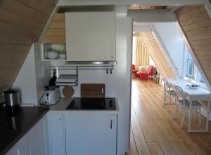 Een keuken of kitchenette bij Kalkmarkt Suites