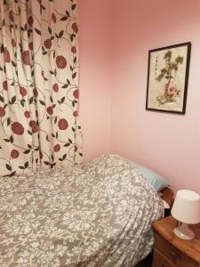 Tempat tidur dalam kamar di Dawlish Sea View Apartment