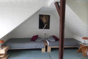 מיטה או מיטות בחדר ב-Haus Gerry