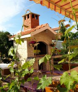 Vonkajšia záhrada v ubytovaní Apartment Adriatic