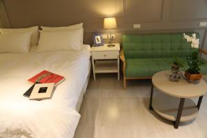 Postel nebo postele na pokoji v ubytování Yuncourt B&B