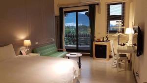 Postel nebo postele na pokoji v ubytování Yuncourt B&B