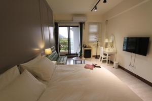 Postel nebo postele na pokoji v ubytování Yuncourt B&B