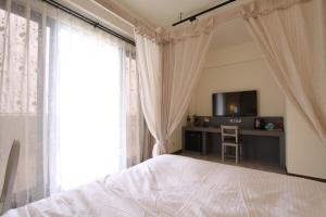 TV a/nebo společenská místnost v ubytování Yuncourt B&B