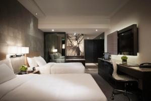 Krevet ili kreveti u jedinici u objektu Gateway Hotel, Marco Polo
