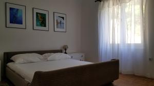 Postel nebo postele na pokoji v ubytování Apartment Viktor