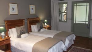 Voodi või voodid majutusasutuse HouseMartin Lodge & Self Catering toas