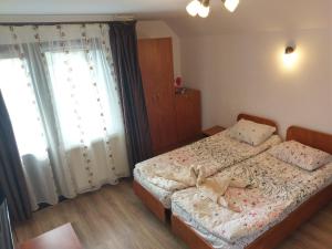 Postel nebo postele na pokoji v ubytování Aterman House