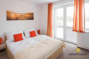 Katil atau katil-katil dalam bilik di Apartmány Jindřichův Hradec