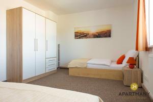 Katil atau katil-katil dalam bilik di Apartmány Jindřichův Hradec