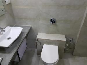Koupelna v ubytování Hotel Paramount Inn