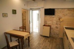 TV a/nebo společenská místnost v ubytování Apartments Seka