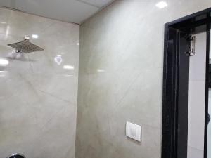 Koupelna v ubytování Hotel Paramount Inn