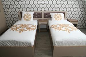 سرير أو أسرّة في غرفة في Hotel Rietgors