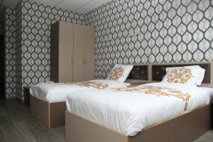 سرير أو أسرّة في غرفة في Hotel Rietgors