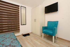 Ruang duduk di Central Located Guest House