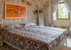 Postel nebo postele na pokoji v ubytování Apartments P&B