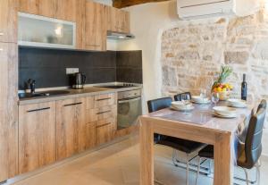 Kuchyň nebo kuchyňský kout v ubytování Apartments P&B
